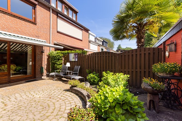 Foto - Te koop: Goed onderhouden tussenwoning in rustige woonwijk!